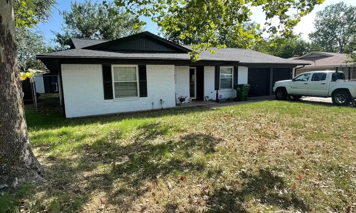 Professional roofing crew working on a residential roof in Doctor Phillips